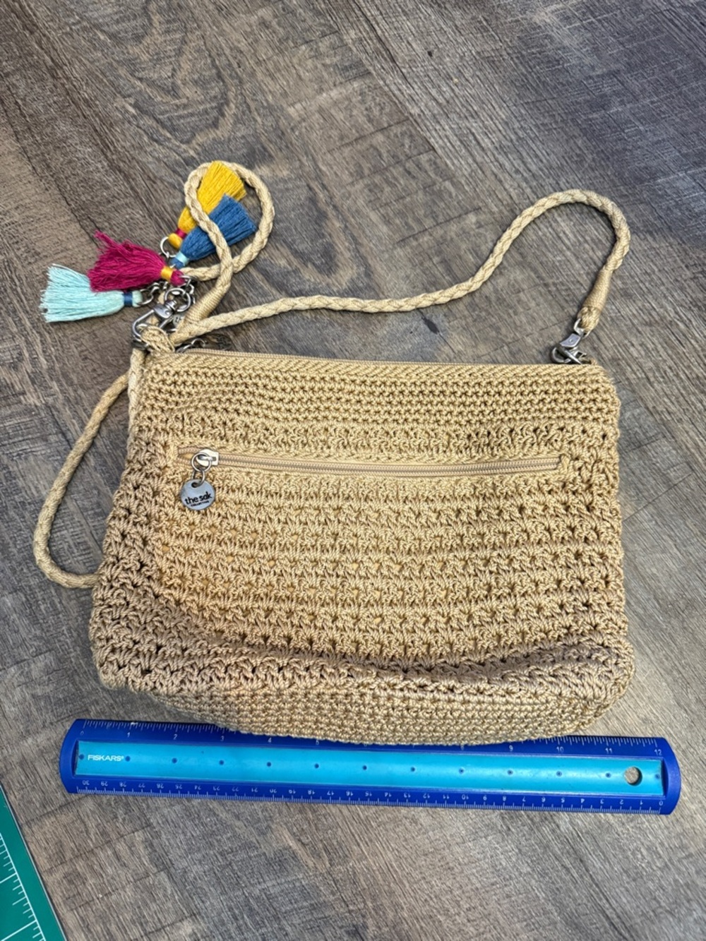 The Sak Tan Crochet Crossbody with Multicolor Tassel Charm